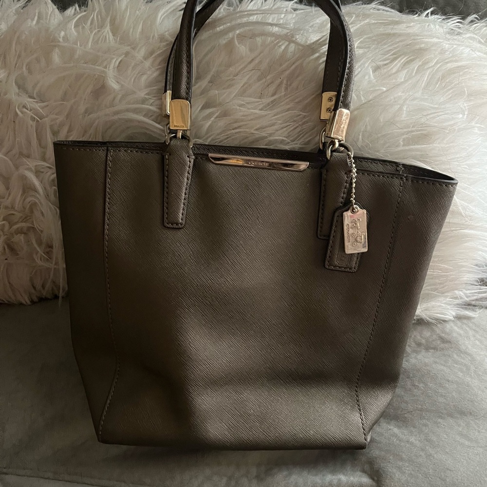 Small gray coach bag. Excellent condition.
